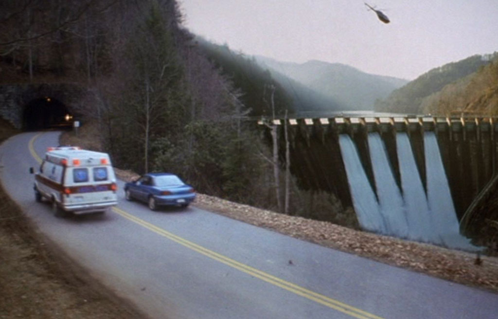 Screen shot of Cheoah Dam from the 1993 movie The Fugitive. Note the tunnel that was added as a special effect.